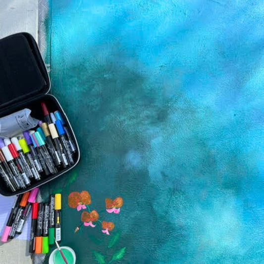 She traded keyboards for painting garden beds and cement pathways!