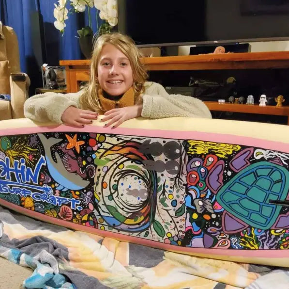 Proud Mum Shares 11-Year-Old Daughter's Inspiring Junior Lifeguard and Surfboard Art Story